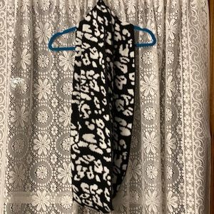 Striking animal print infinity scarf w/ metallic thread accents by Calvin Klein.
